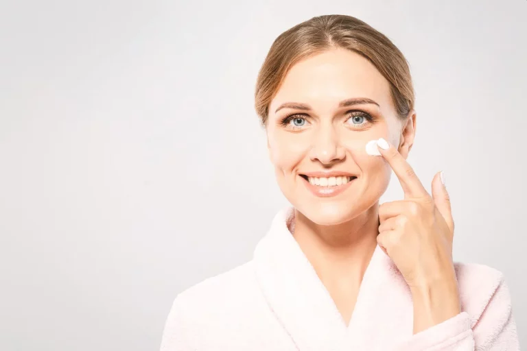 moisturizer a woman applying a moisturizer